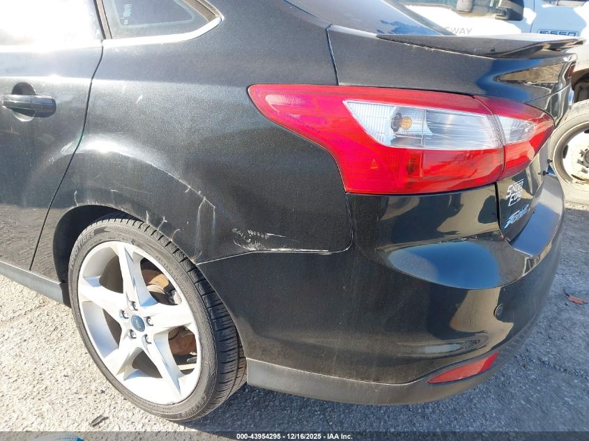 2013 Ford Focus Titanium VIN: 1FADP3J24DL196324 Lot: 43954295