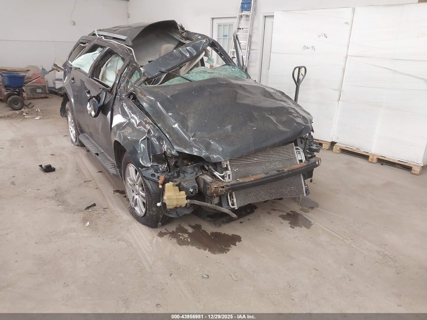 4M2CN9HG4AKJ18475 2010 Mercury Mariner Premier auction photo 1