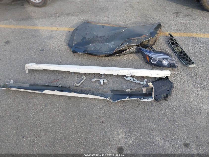 2005 Scion Tc VIN: JTKDE167750051699 Lot: 43957513