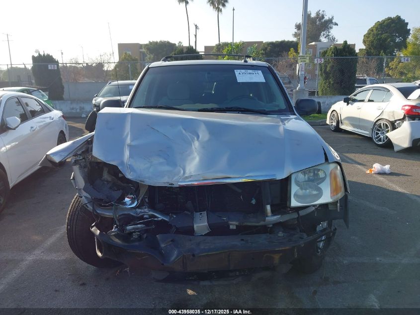 2005 GMC Envoy Sle VIN: 1GKDS13S352357199 Lot: 43958035