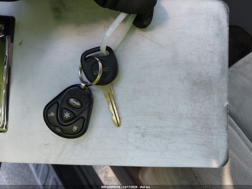 2005 GMC Envoy Sle VIN: 1GKDS13S352357199 Lot: 43958035