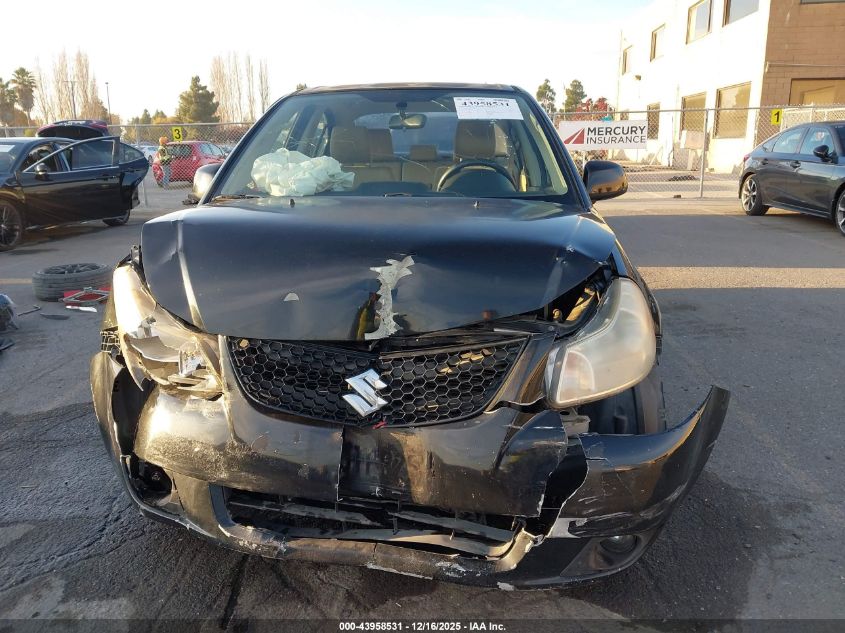 2011 Suzuki Sx4 Le/Le Anniversary Edition VIN: JS2YC5A28B6302262 Lot: 43958531