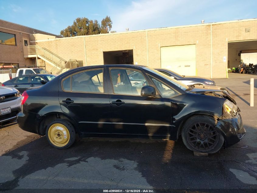 2011 Suzuki Sx4 Le/Le Anniversary Edition VIN: JS2YC5A28B6302262 Lot: 43958531