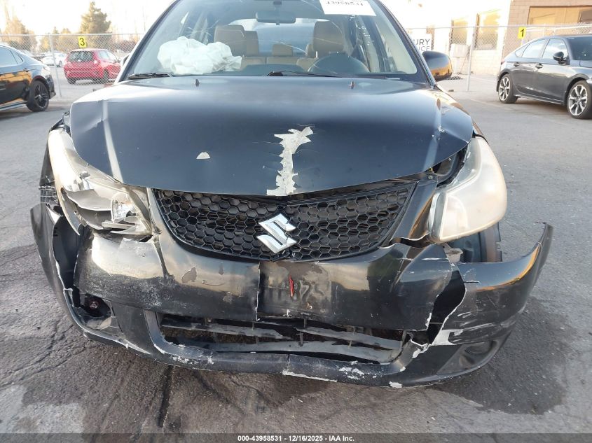 2011 Suzuki Sx4 Le/Le Anniversary Edition VIN: JS2YC5A28B6302262 Lot: 43958531