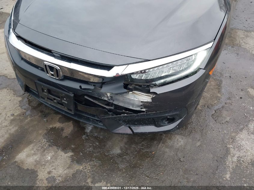 2018 Honda Civic Touring VIN: JHMFC1F95JX031197 Lot: 43959331