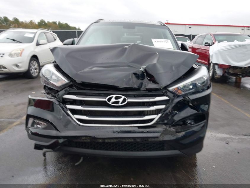 2018 Hyundai Tucson Value VIN: KM8J33A24JU744879 Lot: 43959512