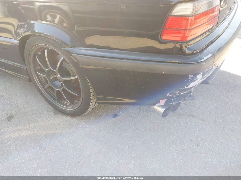 1999 BMW 323Ic VIN: WBABJ7333XEA65488 Lot: 43959673