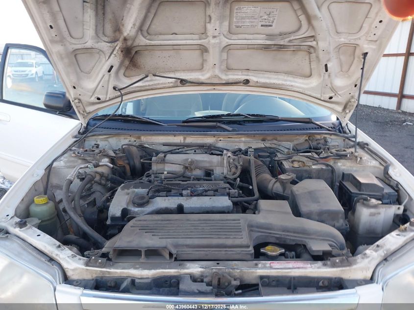 2000 Mazda Protege Dx/Lx VIN: JM1BJ2222Y0276112 Lot: 43960443