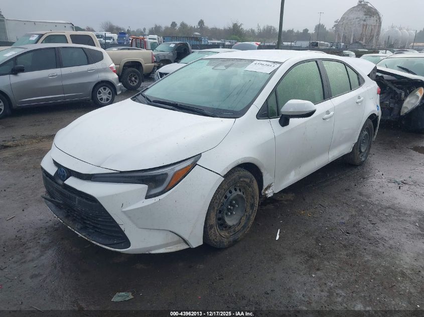 2025 Toyota Corolla Hybrid Le VIN: JTDBCMFE7S3082286 Lot: 43962013