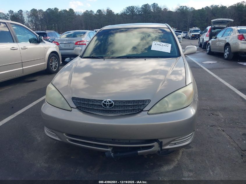 2004 Toyota Camry Le VIN: JTDBE32K540297668 Lot: 43962551