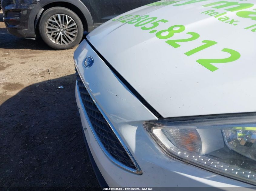 2016 Ford Focus S VIN: 1FADP3E2XGL404849 Lot: 43963540