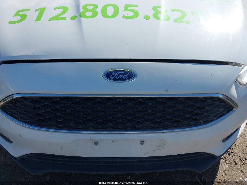 2016 Ford Focus S VIN: 1FADP3E2XGL404849 Lot: 43963540