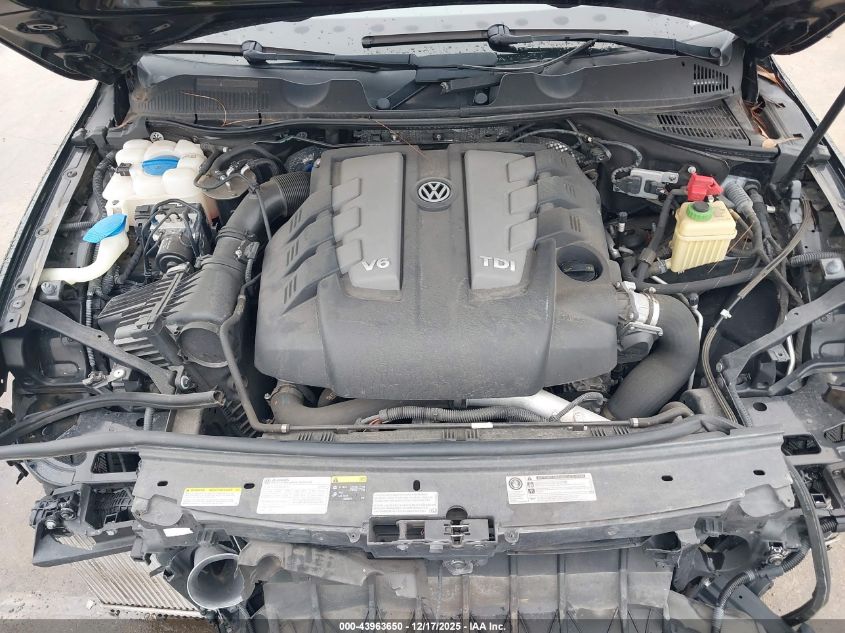 2014 Volkswagen Touareg Tdi Executive VIN: WVGEP9BP7ED011587 Lot: 43963650