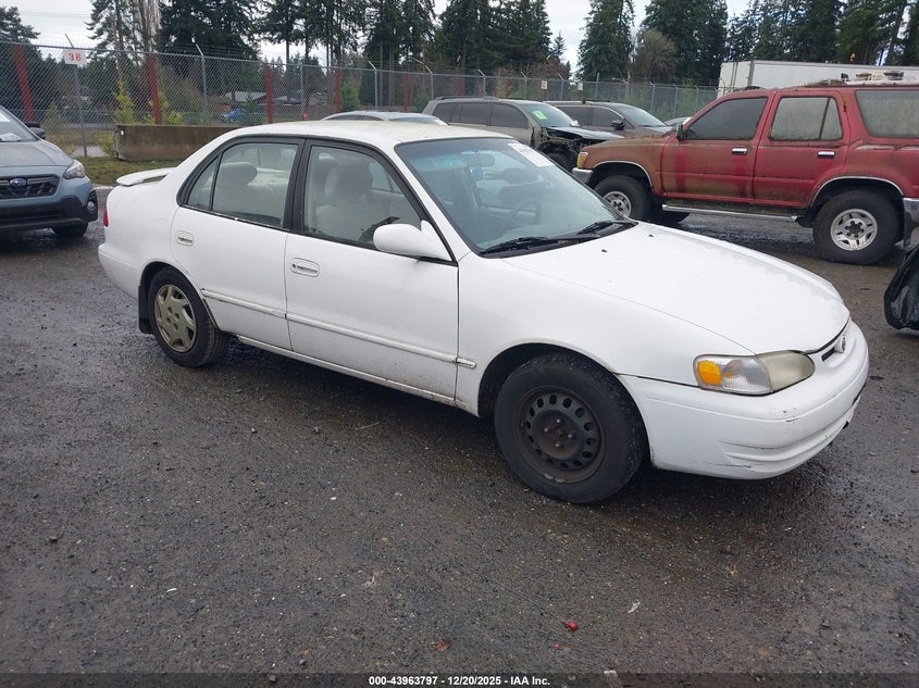 1NXBR12E0XZ279977 1999 Toyota Corolla Le auction photo 1
