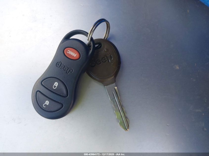 2000 Jeep Grand Cherokee Laredo VIN: 1J4GW48S3YC288398 Lot: 43964172