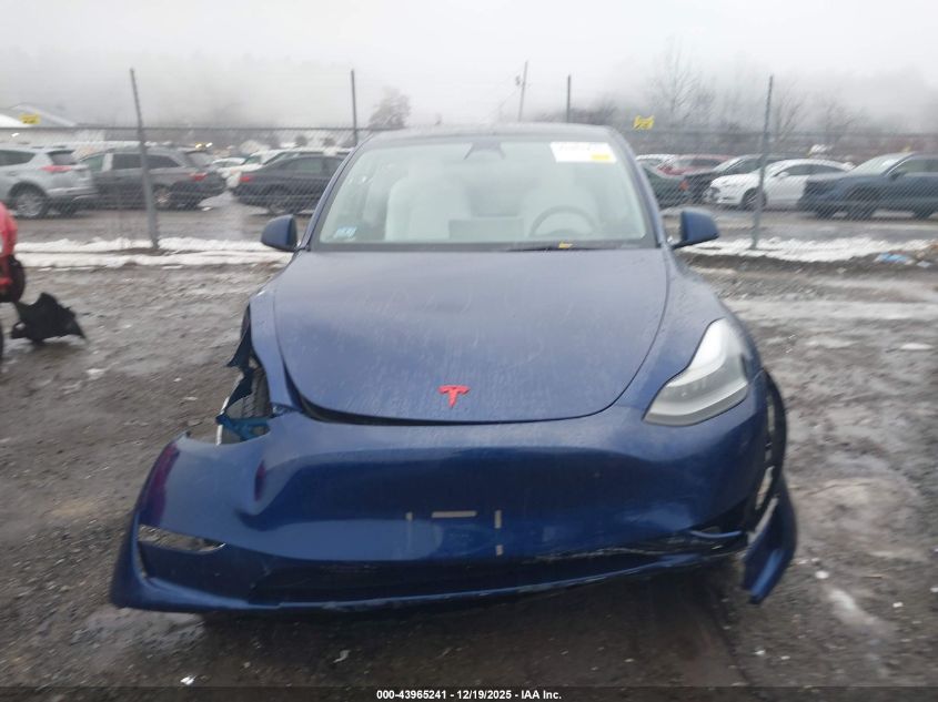 2023 Tesla Model Y Awd/Long Range Dual Motor All-Wheel Drive VIN: 7SAYGDEE4PF684785 Lot: 43965241
