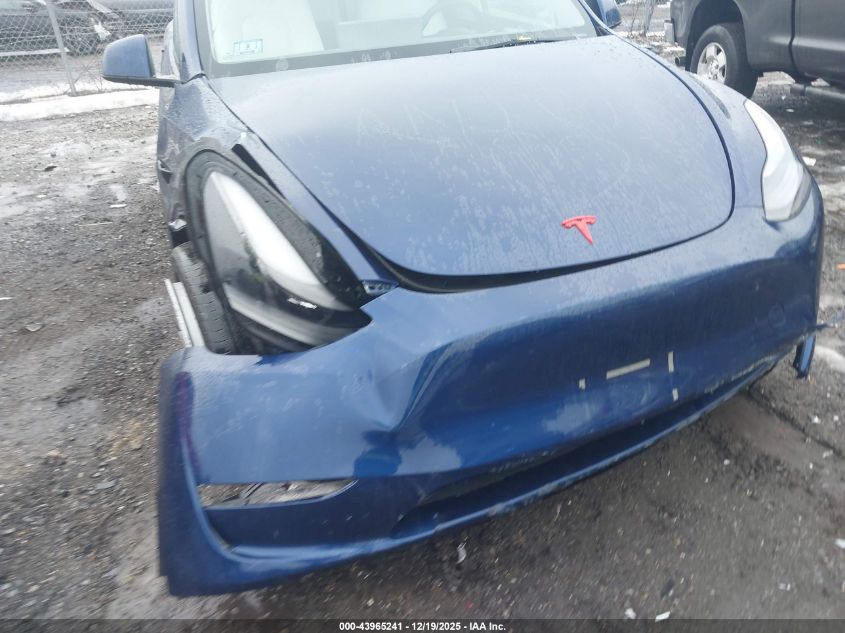 2023 Tesla Model Y Awd/Long Range Dual Motor All-Wheel Drive VIN: 7SAYGDEE4PF684785 Lot: 43965241
