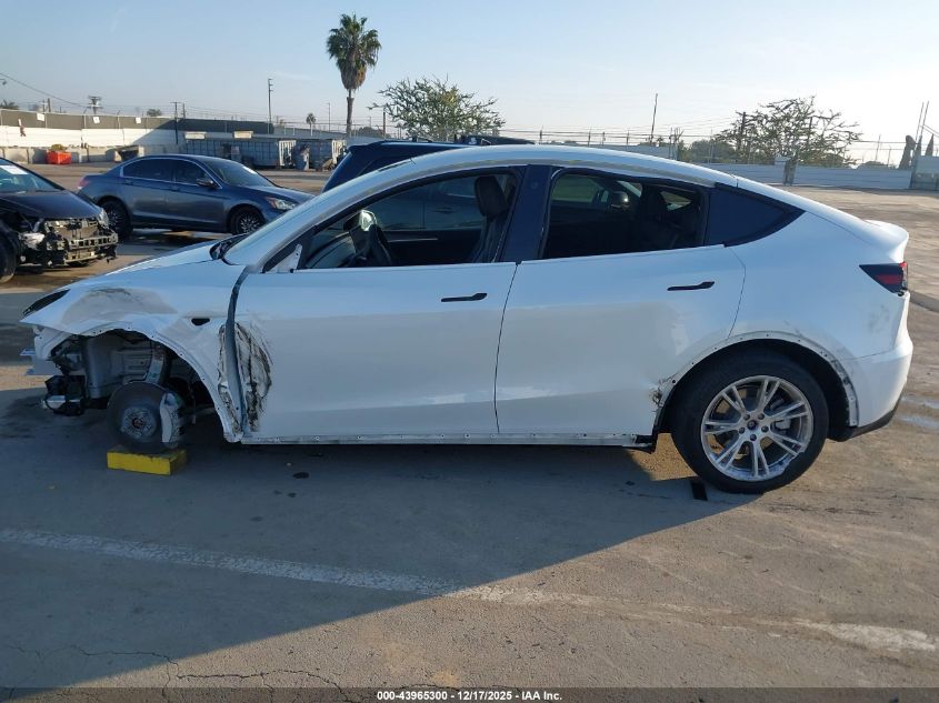 2023 Tesla Model Y Awd/Long Range Dual Motor All-Wheel Drive VIN: 7SAYGDEE2PA123417 Lot: 43965300