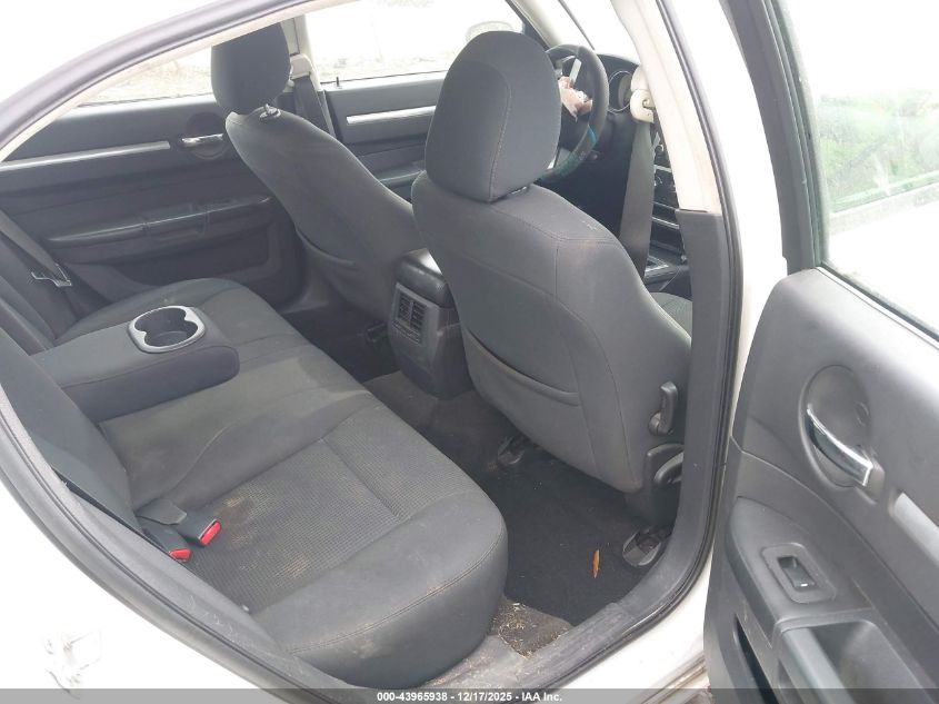 2009 Dodge Charger Sxt VIN: 2B3KA33V39H562208 Lot: 43965938