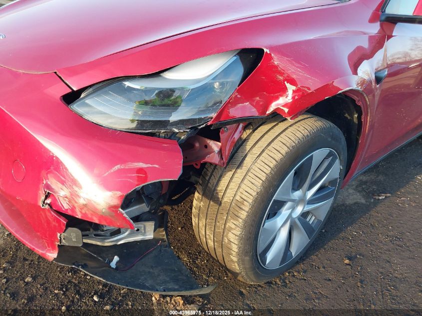 2023 Tesla Model Y Awd/Long Range Dual Motor All-Wheel Drive VIN: 7SAYGDEE0PA185057 Lot: 43965975