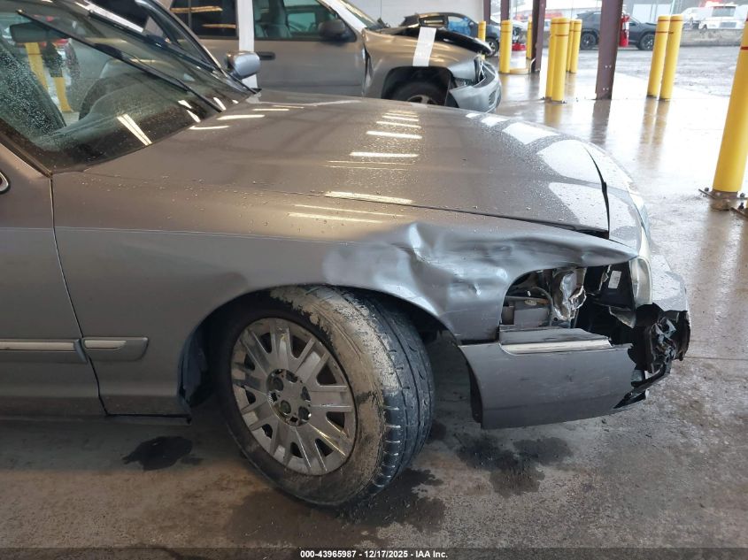 2006 Mercury Grand Marquis Gs VIN: 2MEFM74V16X649599 Lot: 43965987