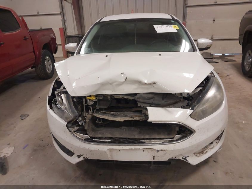 2016 Ford Focus Se VIN: 1FADP3F26GL311857 Lot: 43966847