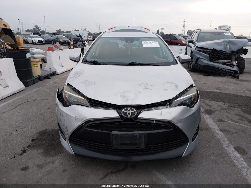 2017 Toyota Corolla Le VIN: 5YFBURHE2HP615586 Lot: 43968739