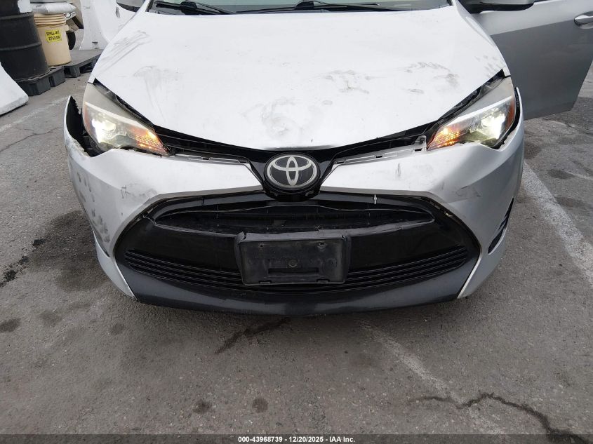 2017 Toyota Corolla Le VIN: 5YFBURHE2HP615586 Lot: 43968739