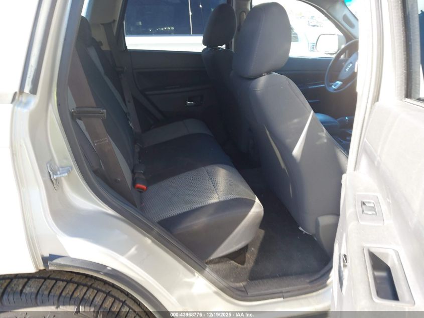 2010 Jeep Grand Cherokee Laredo VIN: 1J4PS4GKXAC104318 Lot: 43968776