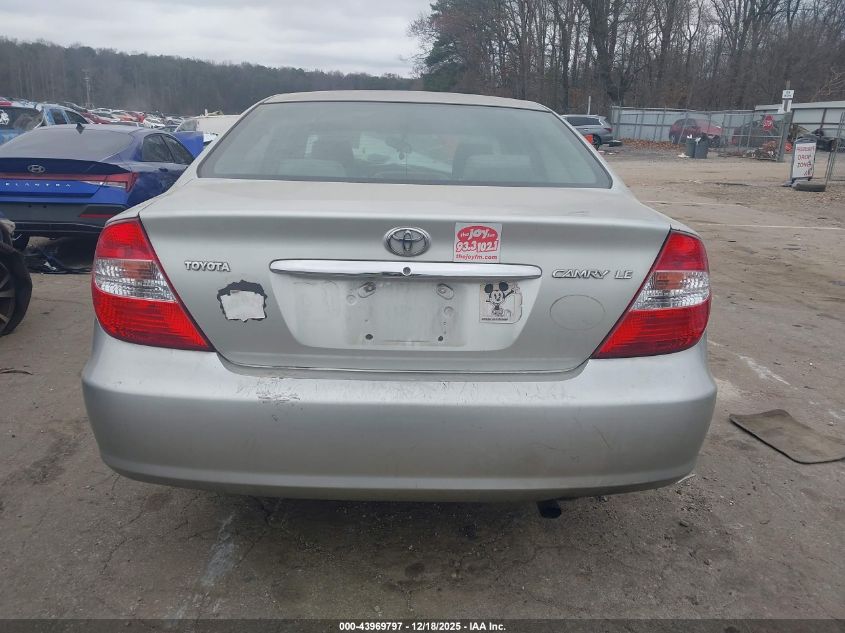2002 Toyota Camry Le VIN: JTDBE32K220080561 Lot: 43969797