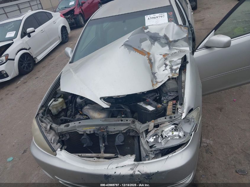 2002 Toyota Camry Le VIN: JTDBE32K220080561 Lot: 43969797