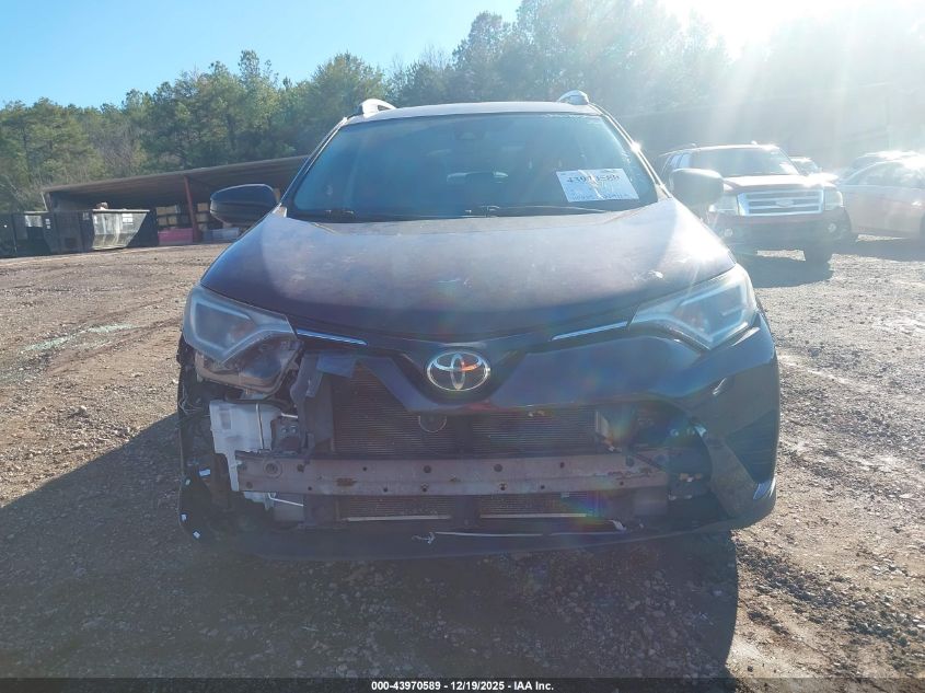 2018 Toyota Rav4 Le VIN: 2T3BFREV9JW719681 Lot: 43970589