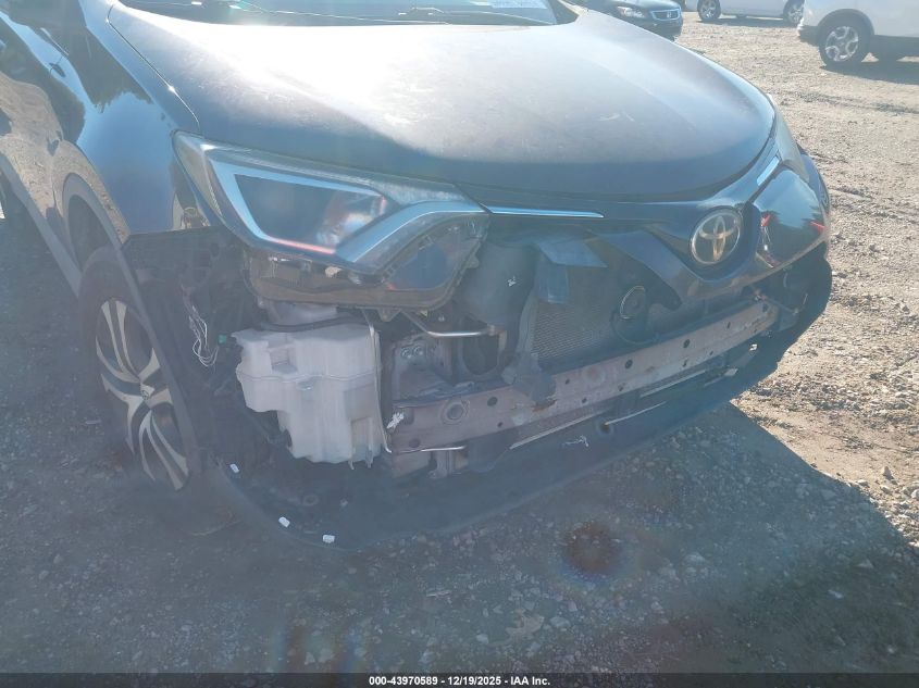 2018 Toyota Rav4 Le VIN: 2T3BFREV9JW719681 Lot: 43970589