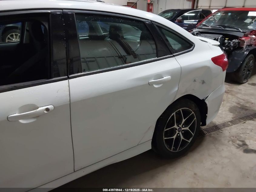 2015 Ford Focus Se VIN: 1FADP3F24FL230113 Lot: 43970944