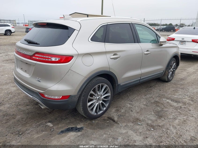 5LMCJ1A90FUJ03894 2015 LINCOLN MKC photo no. 4