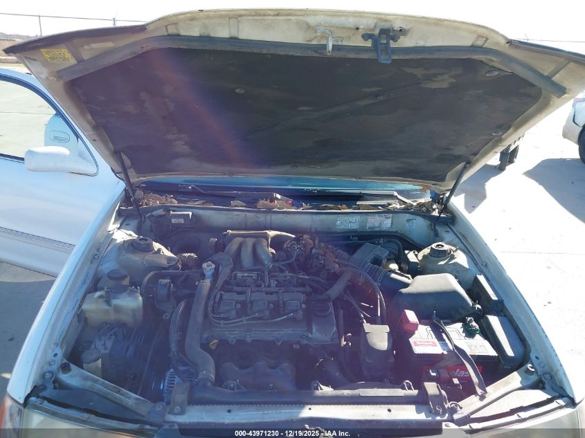 1999 Toyota Avalon Xl VIN: 4T1BF18B0XU317004 Lot: 43971230