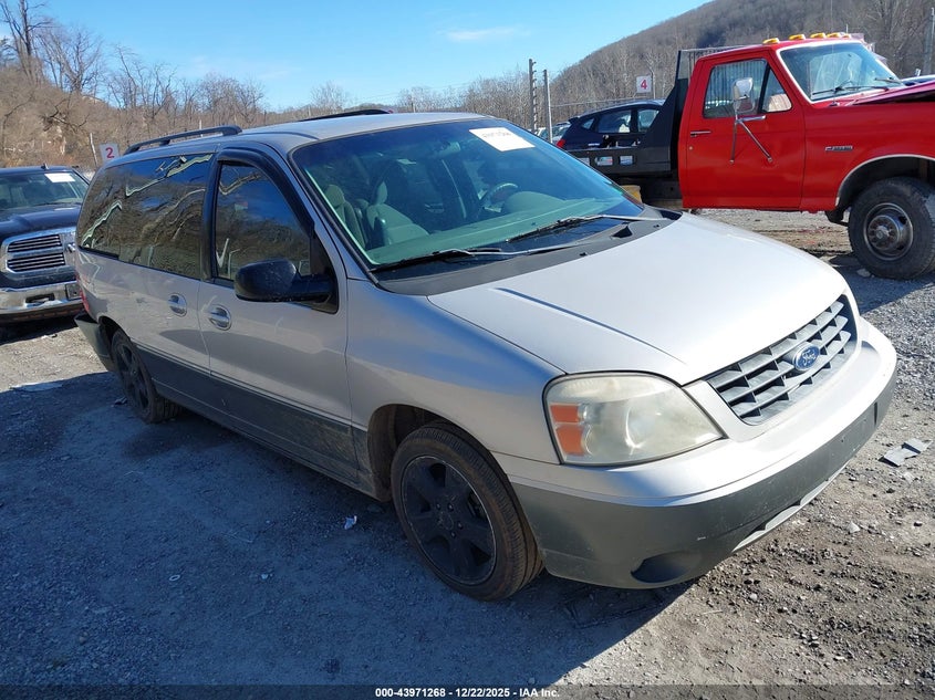 FORD FREESTAR 2004. Lot# 43971268. VIN 2FMDA57684BA80749. Photo 1