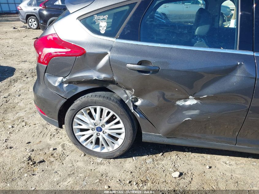 2015 Ford Focus Titanium VIN: 1FADP3N22FL260373 Lot: 43971322