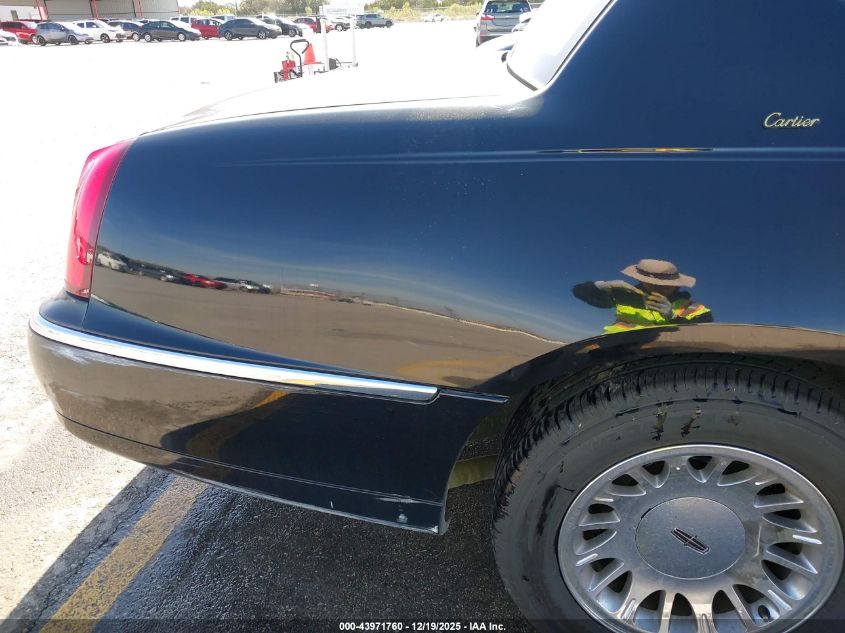 1999 Lincoln Town Car Cartier VIN: 1LNHM83W2XY695286 Lot: 43971760