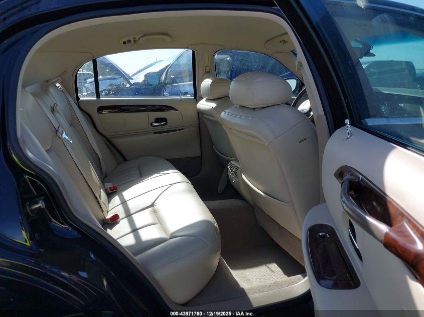 1999 Lincoln Town Car Cartier VIN: 1LNHM83W2XY695286 Lot: 43971760