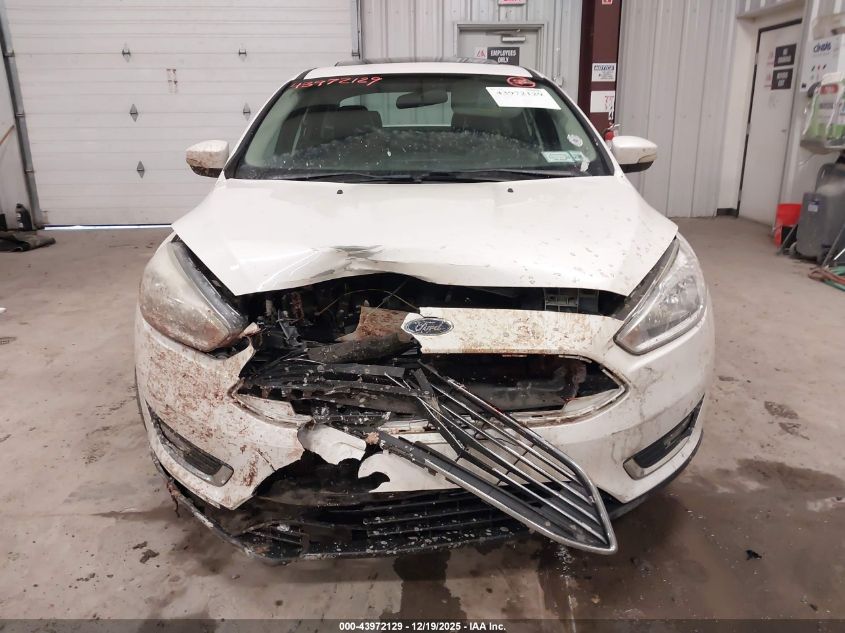 2017 Ford Focus Titanium VIN: 1FADP3J20HL200682 Lot: 43972129