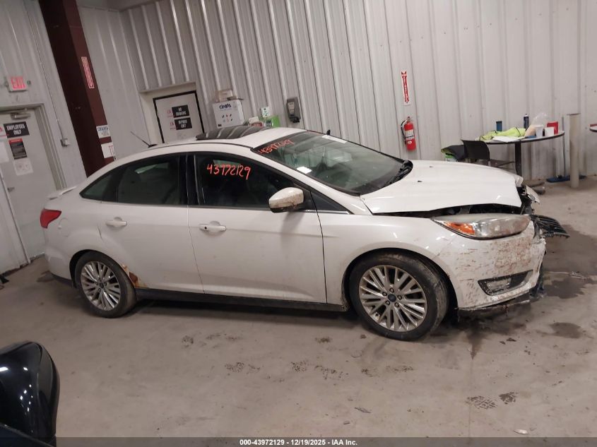 2017 Ford Focus Titanium VIN: 1FADP3J20HL200682 Lot: 43972129
