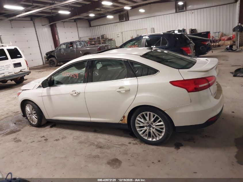 2017 Ford Focus Titanium VIN: 1FADP3J20HL200682 Lot: 43972129