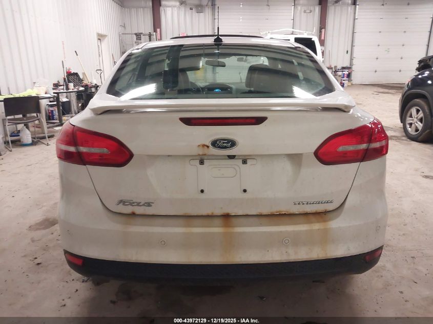 2017 Ford Focus Titanium VIN: 1FADP3J20HL200682 Lot: 43972129