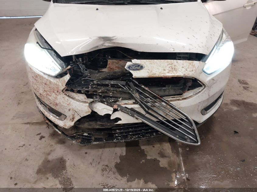 2017 Ford Focus Titanium VIN: 1FADP3J20HL200682 Lot: 43972129