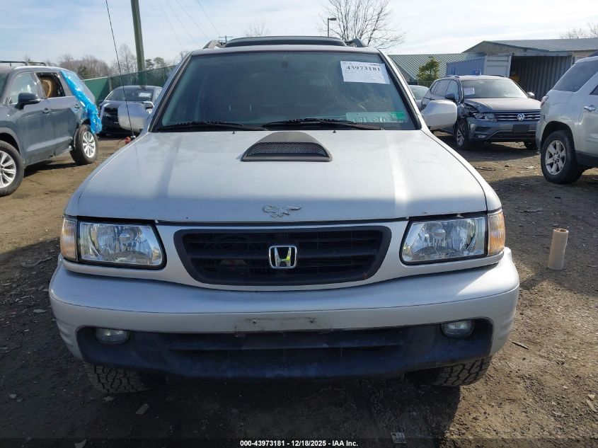 2000 Honda Passport Ex/Lx VIN: 4S6DM58W5Y4411140 Lot: 43973181