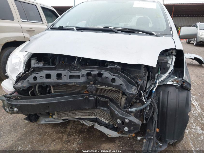 2009 Toyota Yaris VIN: JTDJT903295256490 Lot: 43973953