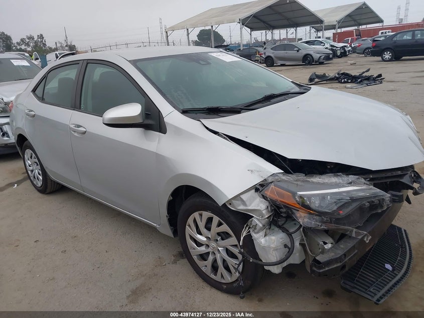 5YFBURHEXJP852753 2018 Toyota Corolla Le auction photo 1