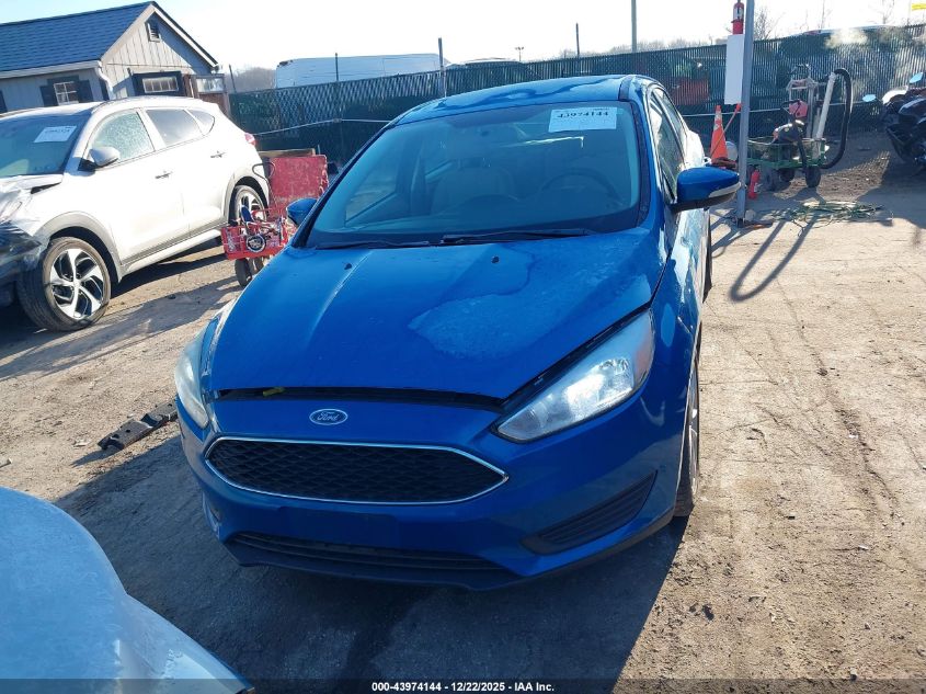 2015 Ford Focus Se VIN: 1FADP3K23FL270883 Lot: 43974144