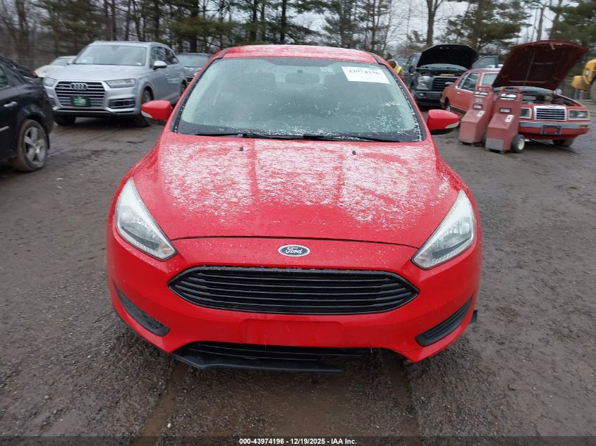 2015 Ford Focus Se VIN: 1FADP3F21FL260234 Lot: 43974196